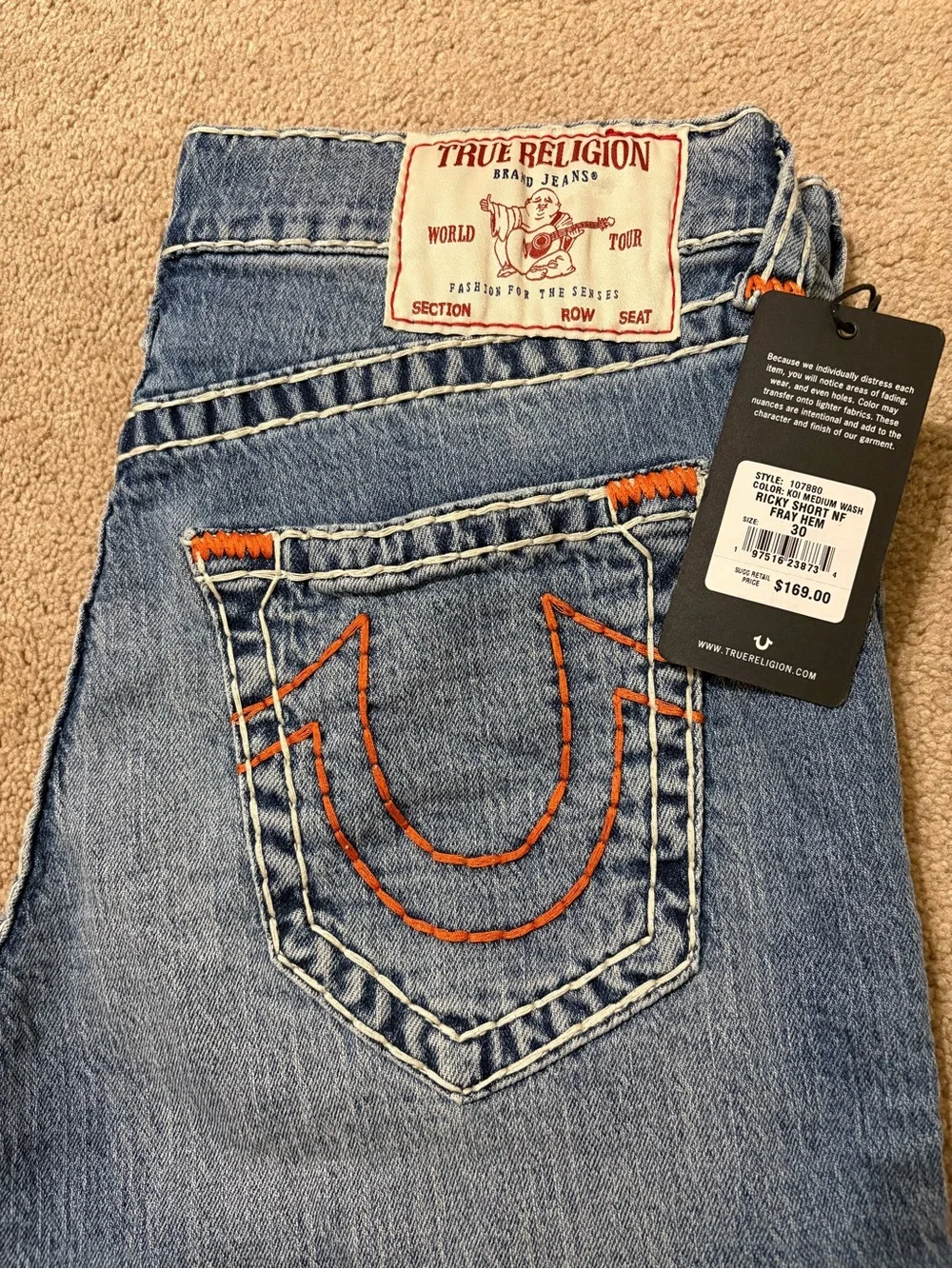 True Religion Light Blue Bootcut Jeans with Orange Stitching
